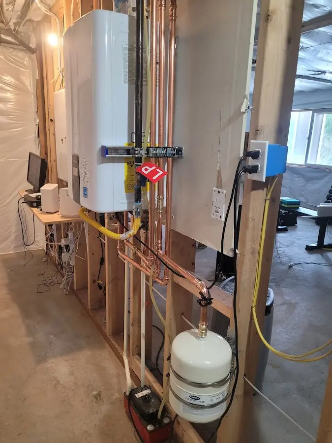 Licensed plumber repairing a kitchen sink in Bastrop